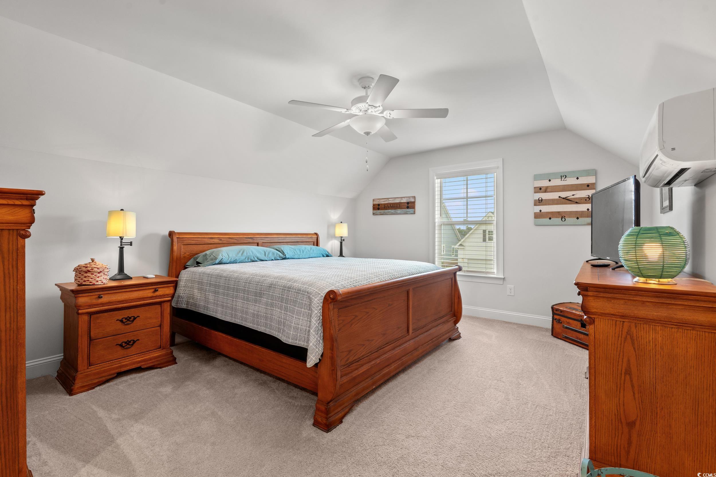 641 Indigo Bay Circle Myrtle Beach, SC 29579 - Photo 26 of 39 Bedroom featuring ceiling fan, lofted ceiling, lig