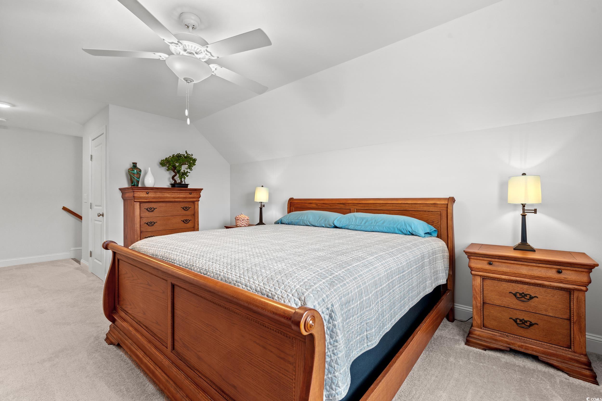 641 Indigo Bay Circle Myrtle Beach, SC 29579 - Photo 27 of 39 Carpeted bedroom featuring ceiling fan and lofted