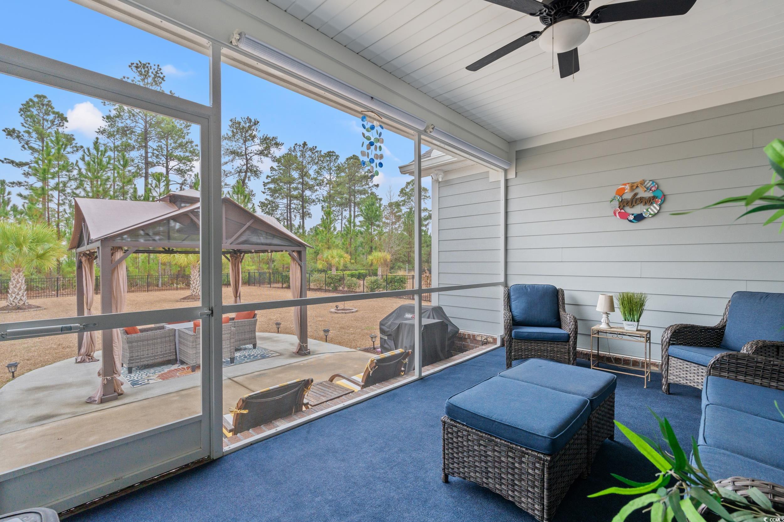 641 Indigo Bay Circle Myrtle Beach, SC 29579 - Photo 30 of 39 Sunroom featuring a healthy amount of sunlight and