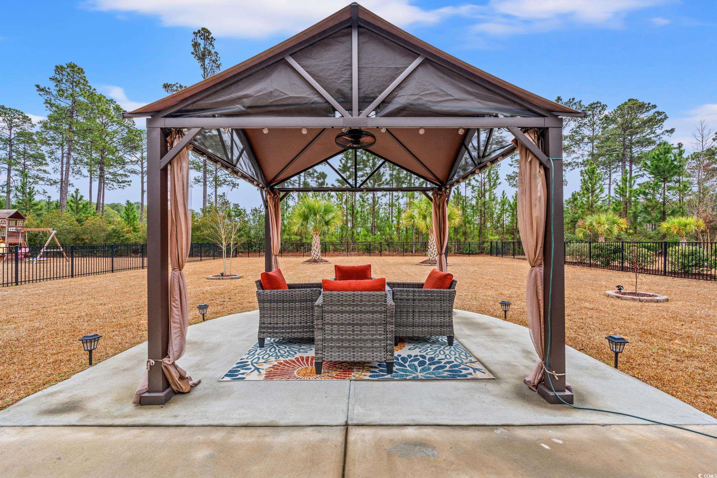 641 Indigo Bay Circle Myrtle Beach, SC 29579 - Photo 31 of 39 View of patio featuring a gazebo