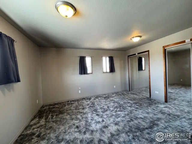 a room with a sink and a mirror