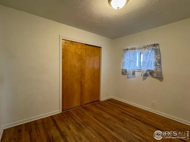 a view of small space with wooden floor