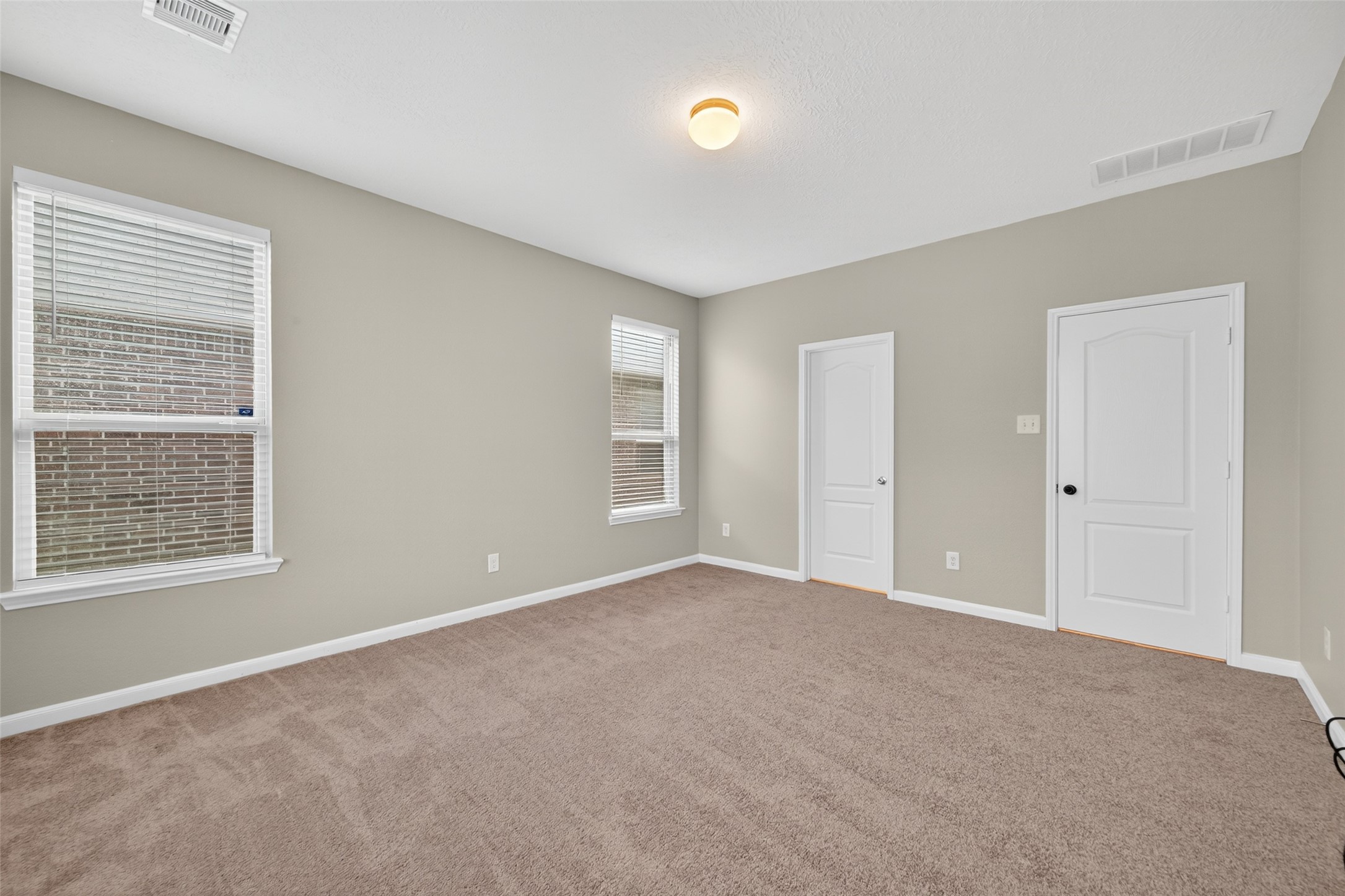 25403 King Reyes Street Katy, TX 77493 - Photo 24 of 27 a view of an empty room with a window