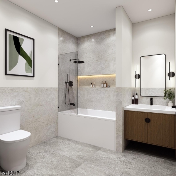 225 Broad Street, Unit 1D Elizabeth, NJ 07201 - Photo 2 of 5 a bathroom with a toilet a sink and bathtub