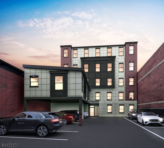 225 Broad Street, Unit 1D Elizabeth, NJ 07201 - Photo 4 of 5 a car parked in front of a house