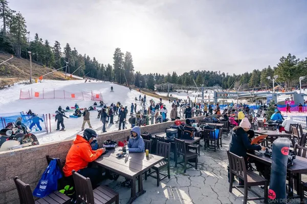 a view of a park with swings and slides