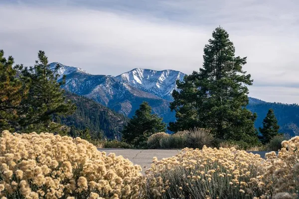 a sign board with parking space