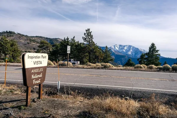a sign on the side of the road