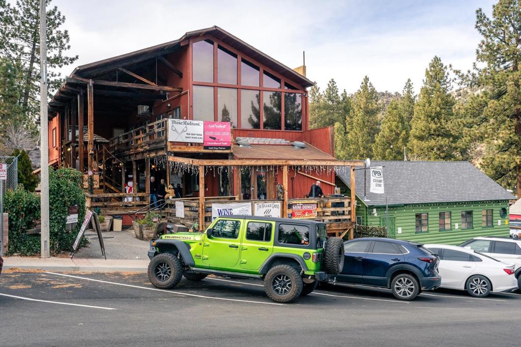 0 Timberline Drive Wrightwood, CA 92397 - Photo 42 of 52 a car parked in front of a house