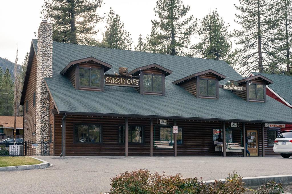 0 Timberline Drive Wrightwood, CA 92397 - Photo 44 of 52 a front view of a house with a yard and garage