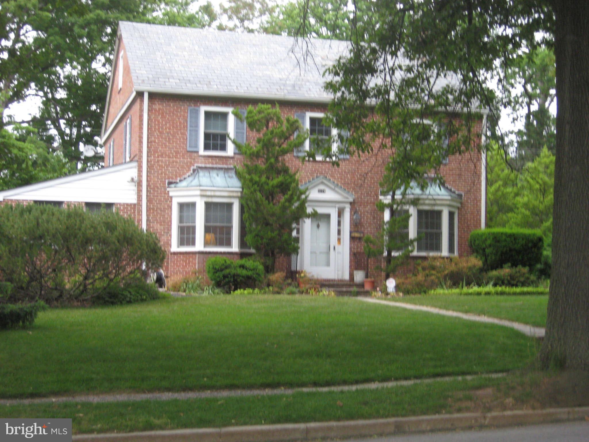 3224 Fallstaff Road Baltimore, MD 21209 - Photo 1 of 17 a front view of a house with a yard