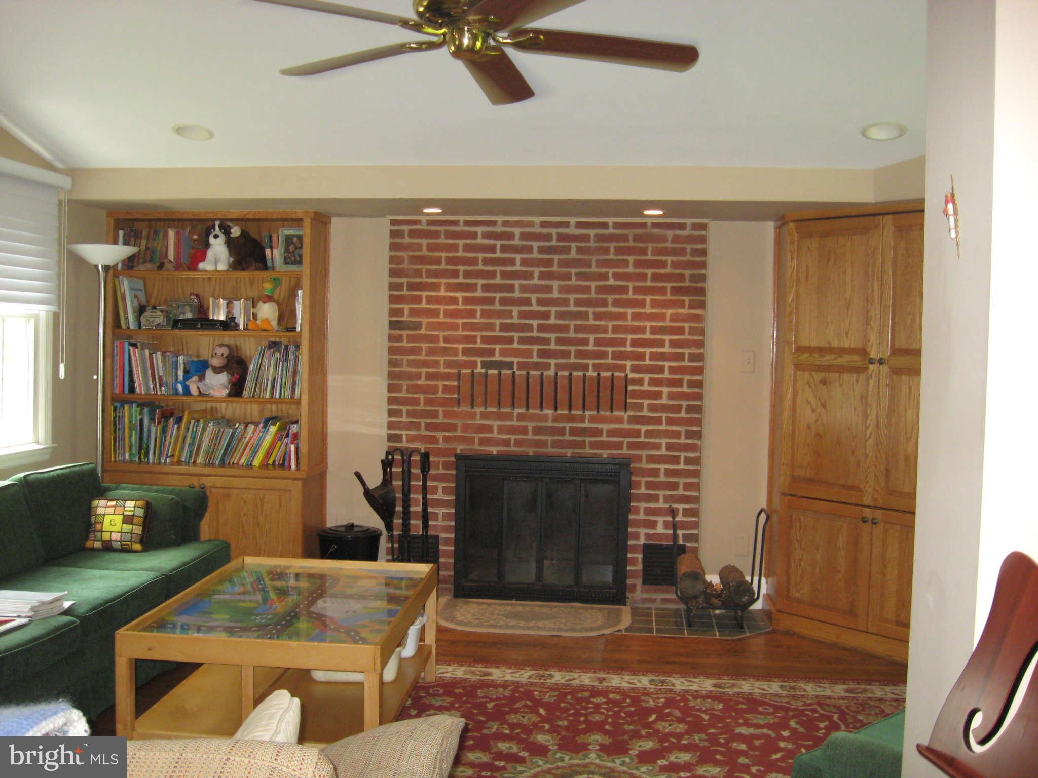 3224 Fallstaff Road Baltimore, MD 21209 - Photo 4 of 17 a living room with furniture and a fireplace