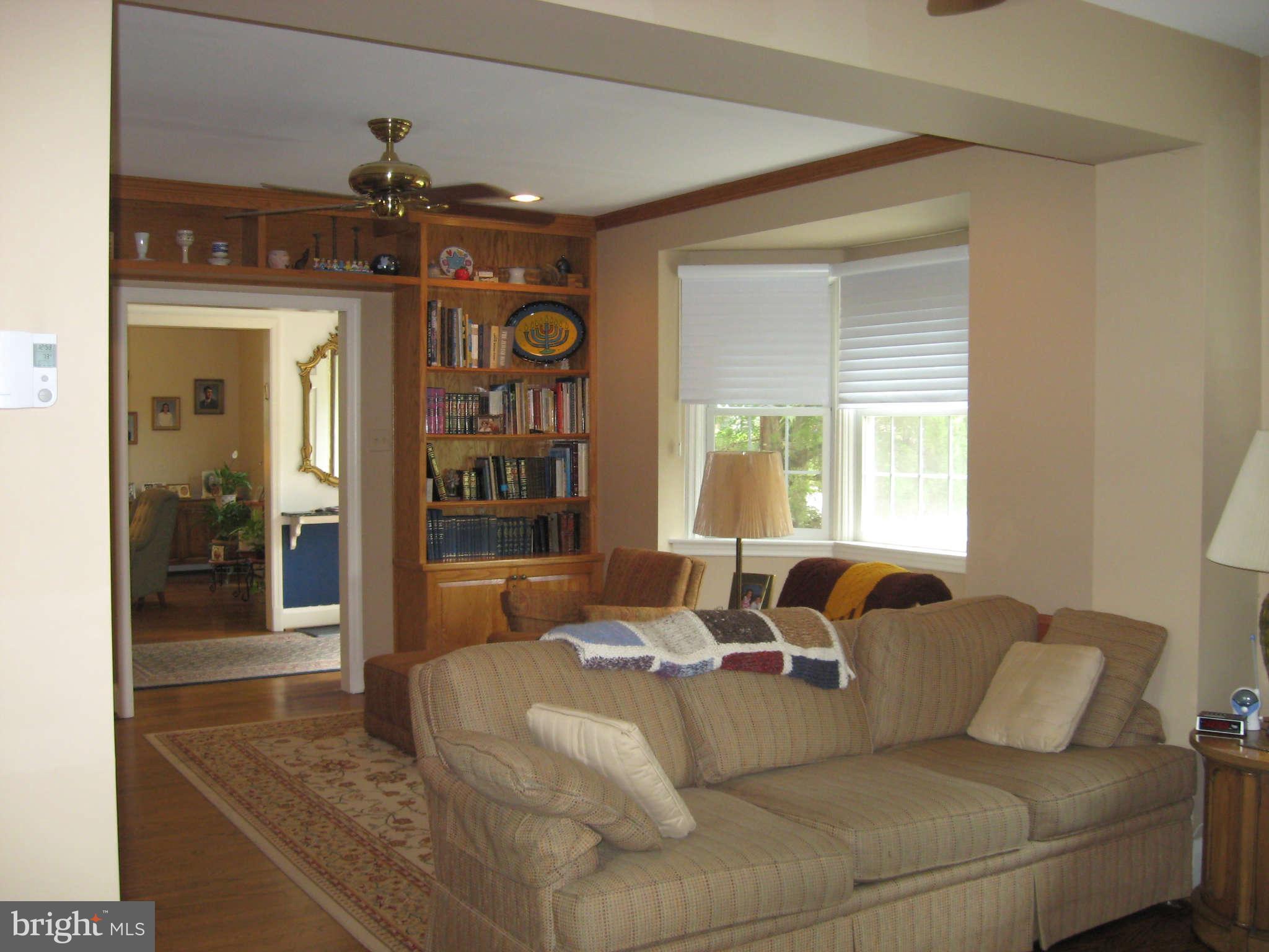 3224 Fallstaff Road Baltimore, MD 21209 - Photo 6 of 17 a living room with furniture and a window