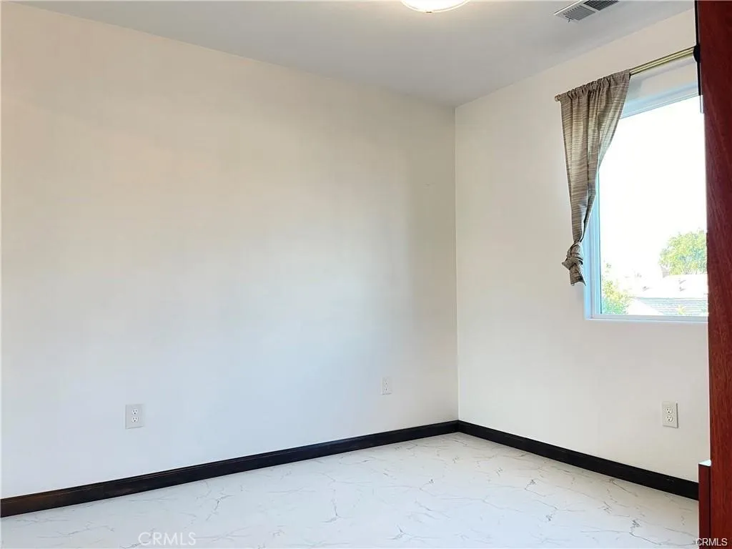 3823 Walnut Grove Avenue Rosemead, CA 91770 - Photo 16 of 28 a view of a small space with a window
