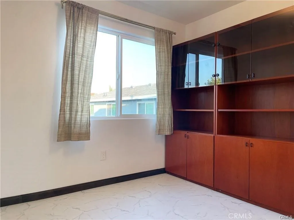 3823 Walnut Grove Avenue Rosemead, CA 91770 - Photo 17 of 28 a view of an empty room with a window