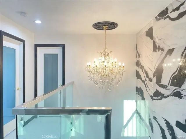 a view of a chandelier in a room