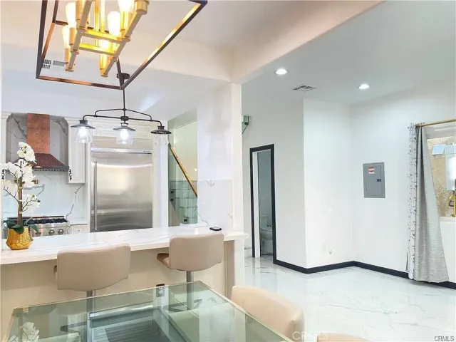 a bathroom with a sink a mirror and a bathtub