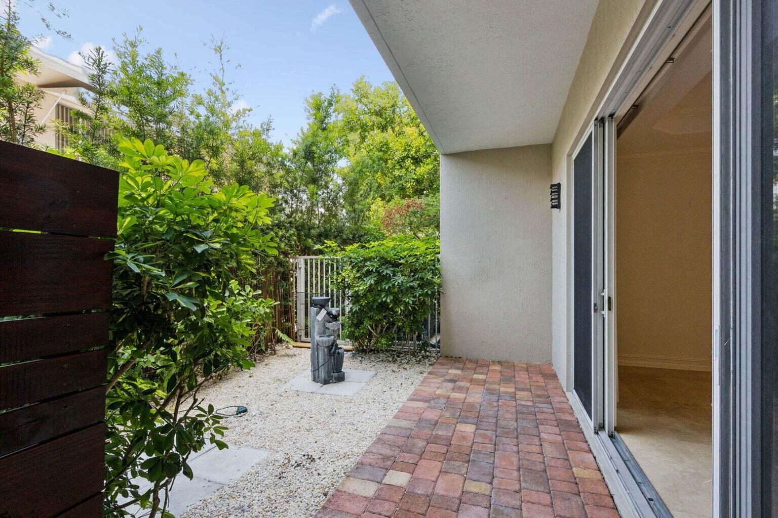 3873 Northeast 22nd Way Lighthouse Point, FL 33064 - Photo 14 of 43 a view of a pathway with a pathway