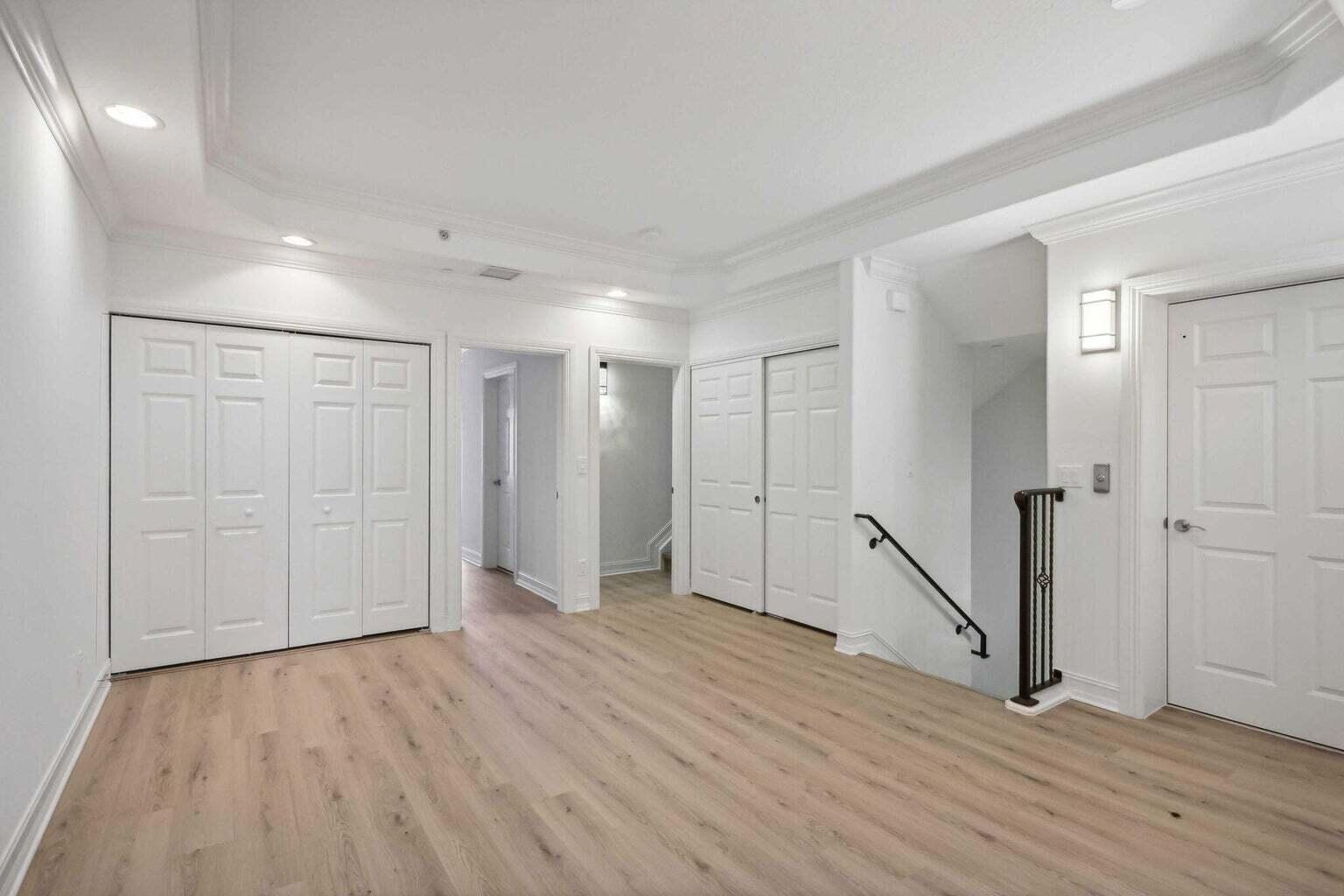3873 Northeast 22nd Way Lighthouse Point, FL 33064 - Photo 16 of 43 a view of empty room with wooden floor