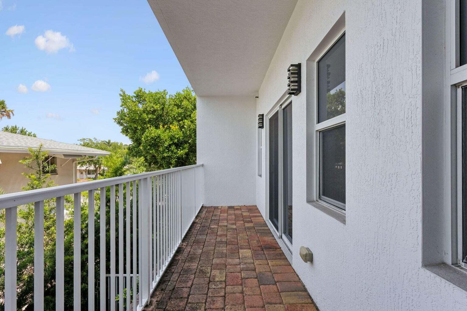 3873 Northeast 22nd Way Lighthouse Point, FL 33064 - Photo 29 of 43 a view of a balcony