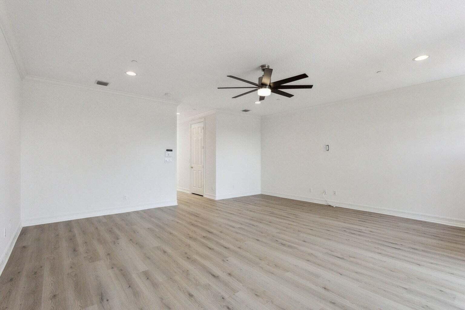 3873 Northeast 22nd Way Lighthouse Point, FL 33064 - Photo 34 of 43 wooden floor in an empty room