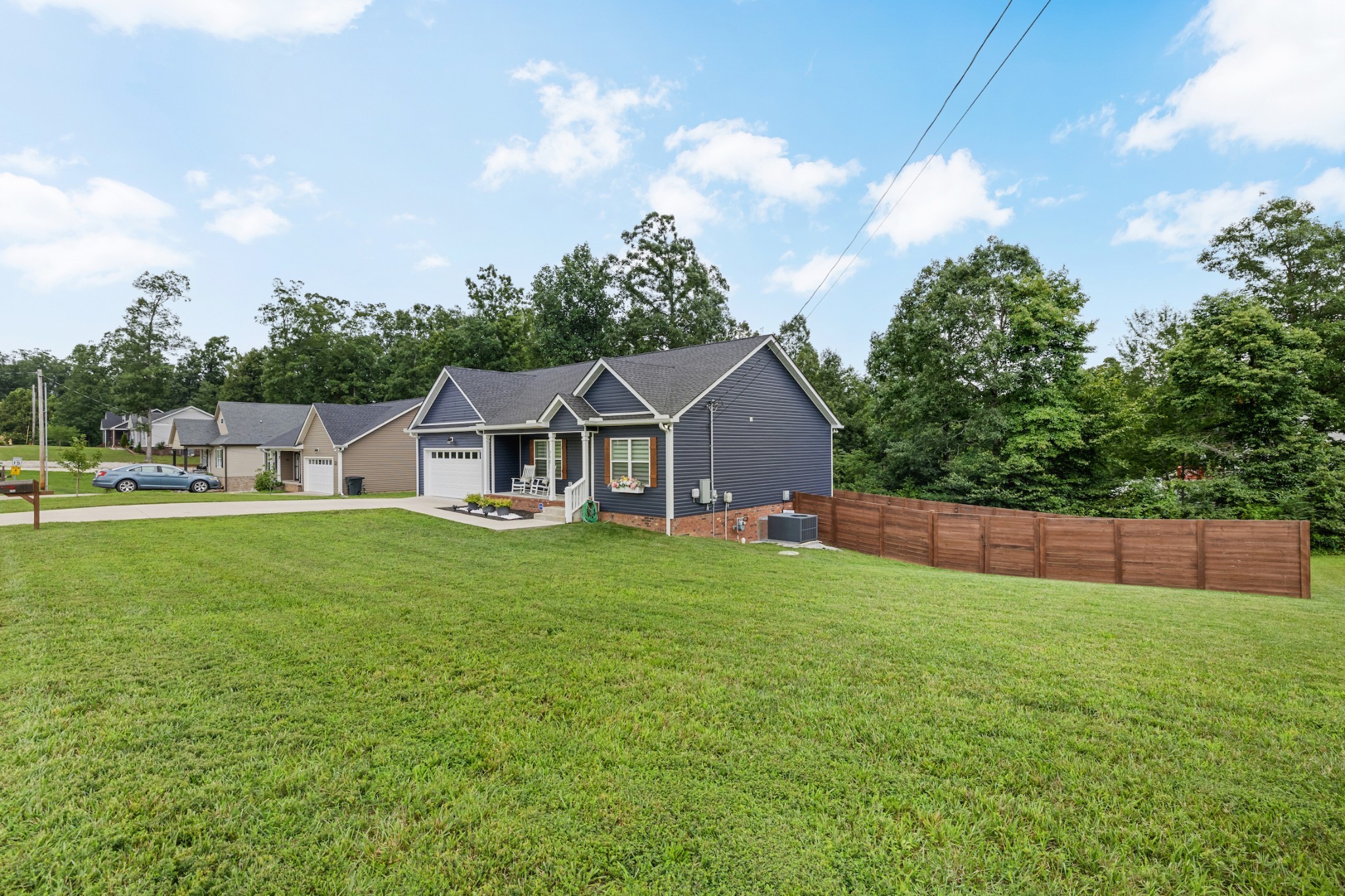 711 Ruby Way White Bluff, TN 37187 - Photo 3 of 24 a front view of house with yard and green space