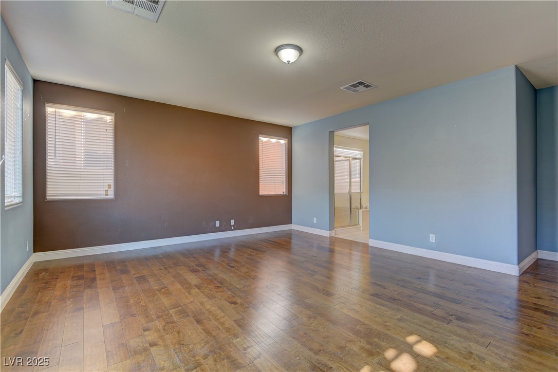 972 Rue Grand Paradis Lane Henderson, NV 89011 - Photo 15 of 32 Unfurnished room featuring hardwood / wood-style floors and baseboards