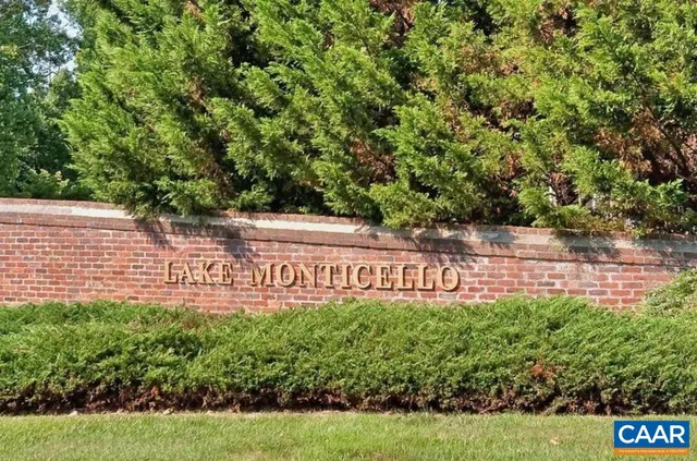 a view of outdoor space with signage and flags