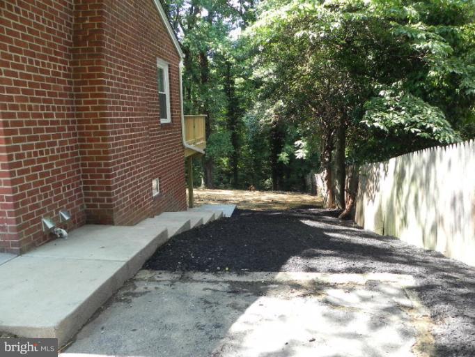 5106 Sharon Road Temple Hills, MD 20748 - Photo 8 of 19 Side walk to back/basement