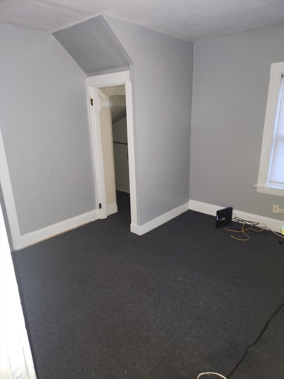 59 Banks Street, Unit 1 Brockton, MA 02302 - Photo 5 of 6 an empty room with a window