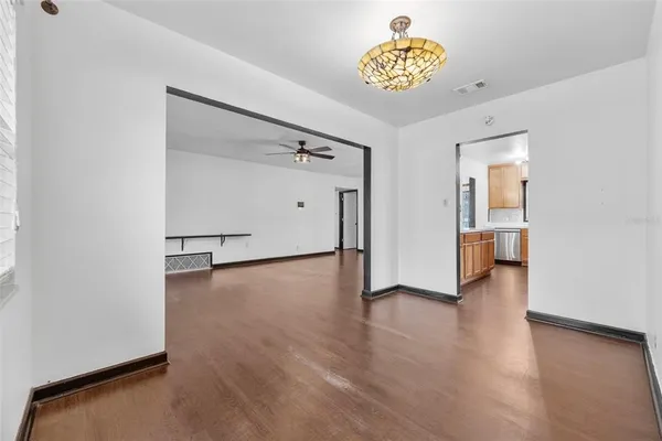 a kitchen with stainless steel appliances a refrigerator and a stove