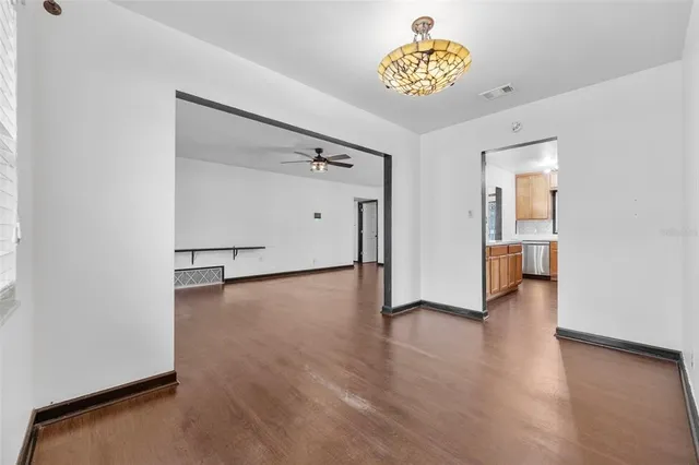 a kitchen with stainless steel appliances a refrigerator and a stove
