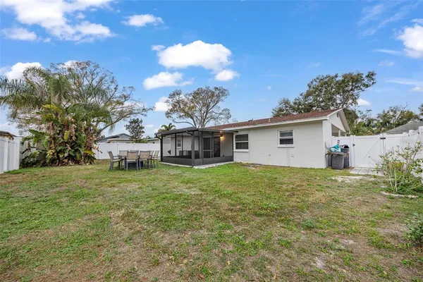 a view of an empty room with a large window