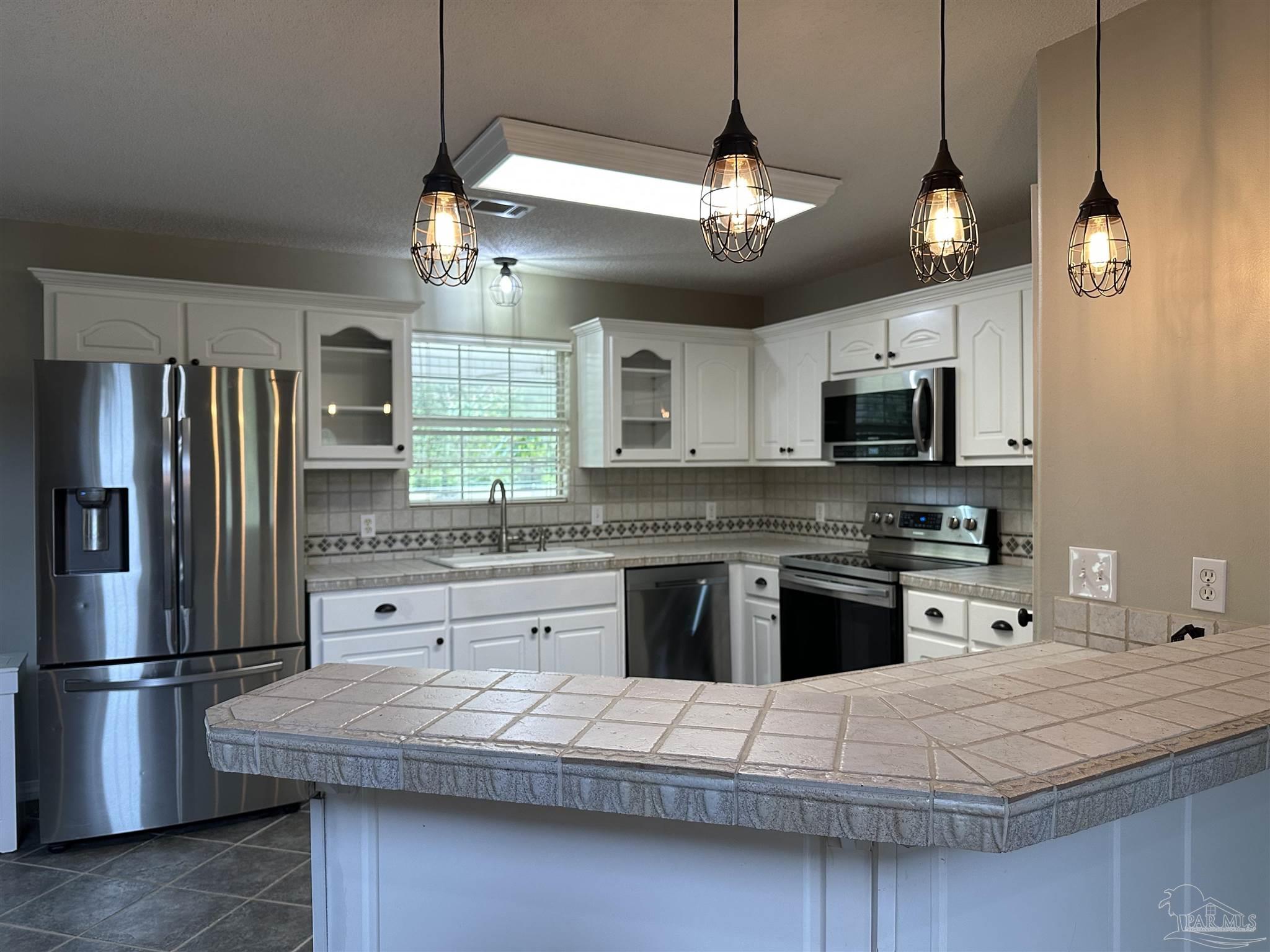 4500 Cedar Springs Road Holt, FL 32564 - Photo 4 of 48 Gallery Image 4