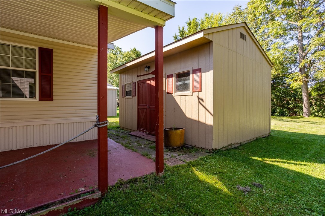 168 Coen Road Vermilion, OH 44089 - Photo 3 of 29 View of shed / structure featuring an outdoor structure and a lawn