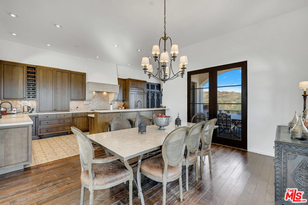9785 Deer Creek Road Malibu, CA 90265 - Photo 16 of 75 a view of a dining room and livingroom view