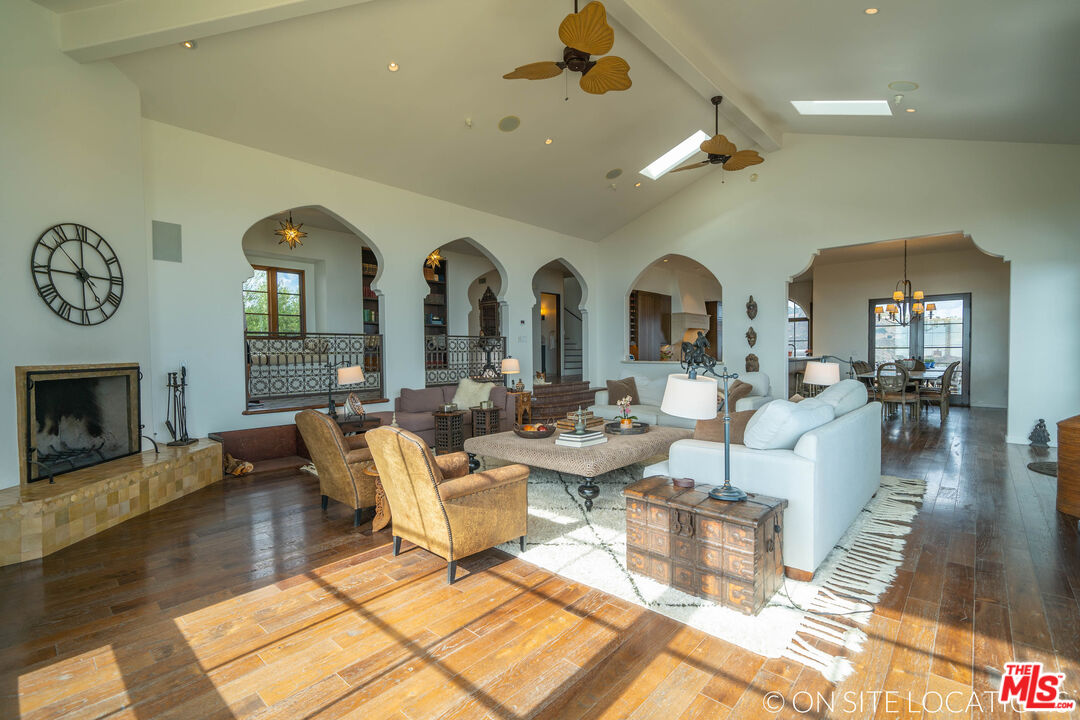 9785 Deer Creek Road Malibu, CA 90265 - Photo 10 of 75 a living room with fireplace furniture and a fireplace