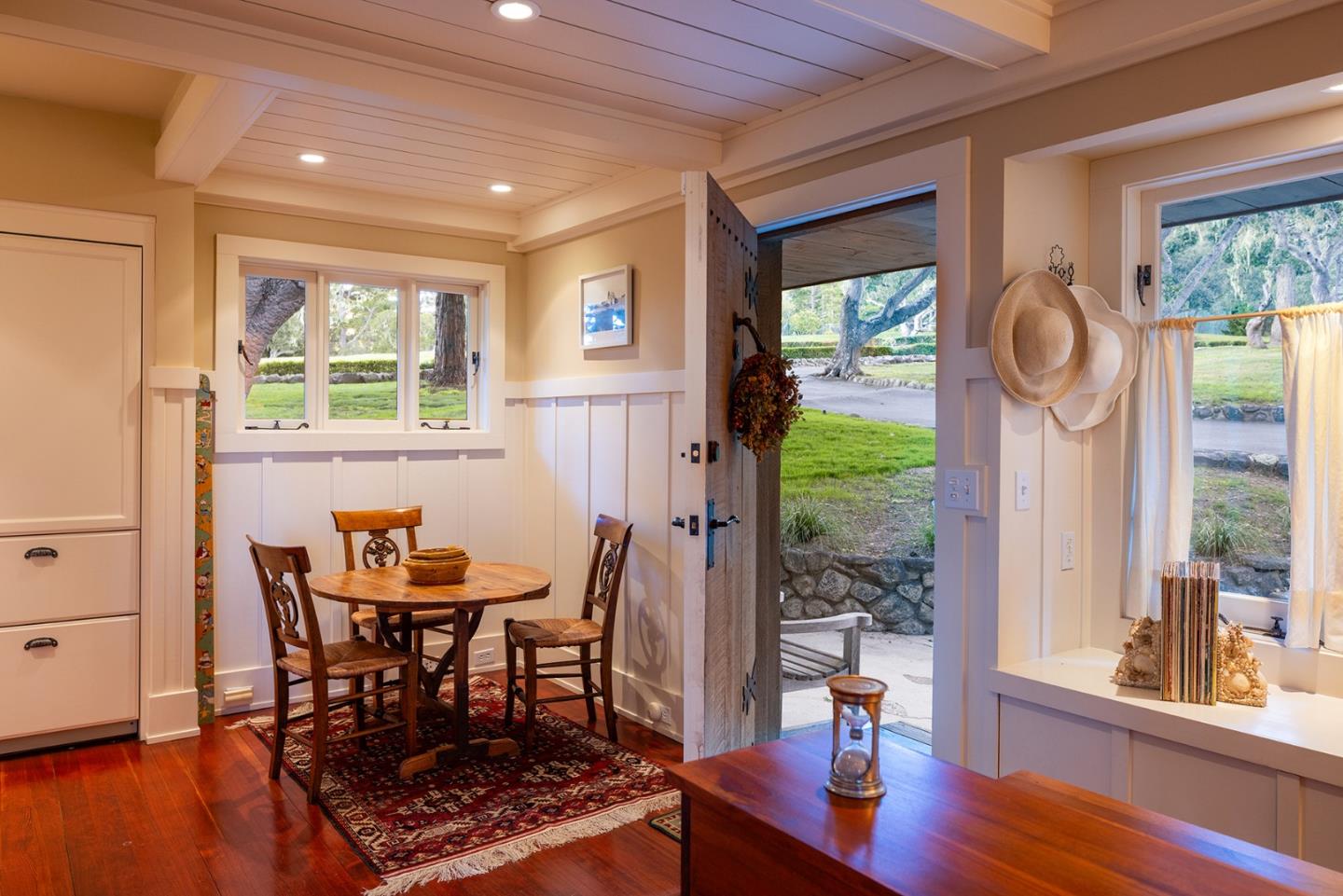 72 Fern Canyon Road Carmel, CA 93923 - Photo 52 of 66 a view of a dining room with furniture window and wooden floor