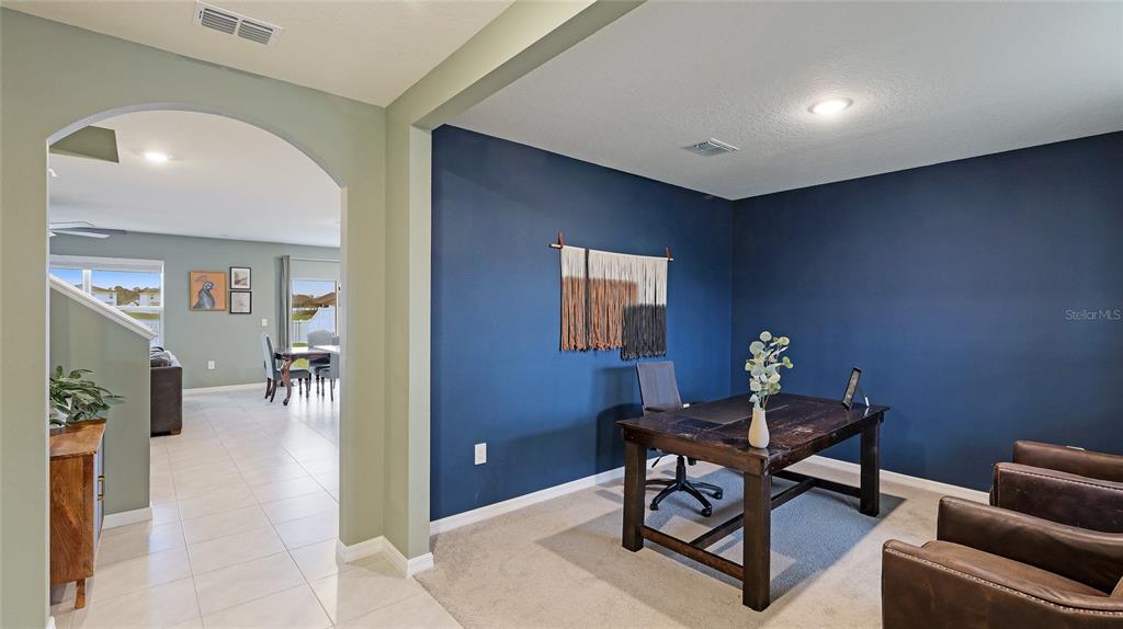 2118 Grand Flora Trail Bradenton, FL 34208 - Photo 18 of 67 a workspace with furniture and window