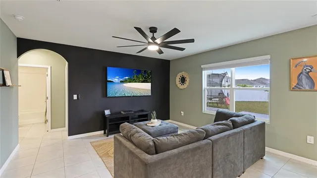 a living room with furniture and a window