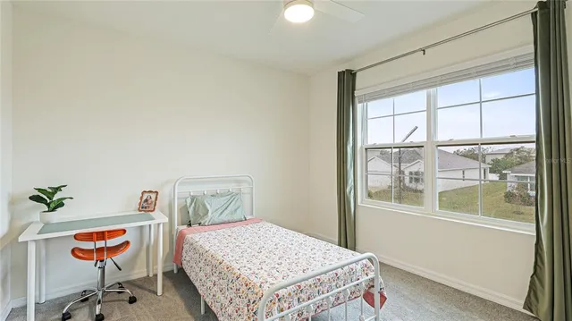 a view of a swimming pool and an outdoor seating