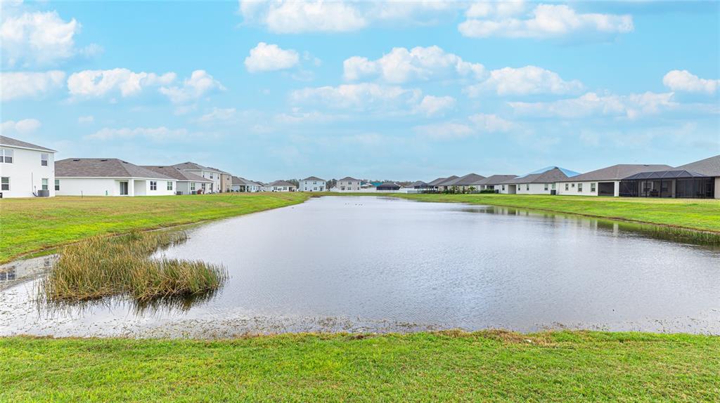 2118 Grand Flora Trail Bradenton, FL 34208 - Photo 55 of 67 a view of a lake with a city
