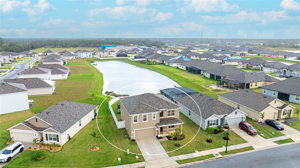 2118 Grand Flora Trail Bradenton, FL 34208 - Photo 6 of 67 an aerial view of residential houses with outdoor space and swimming pool