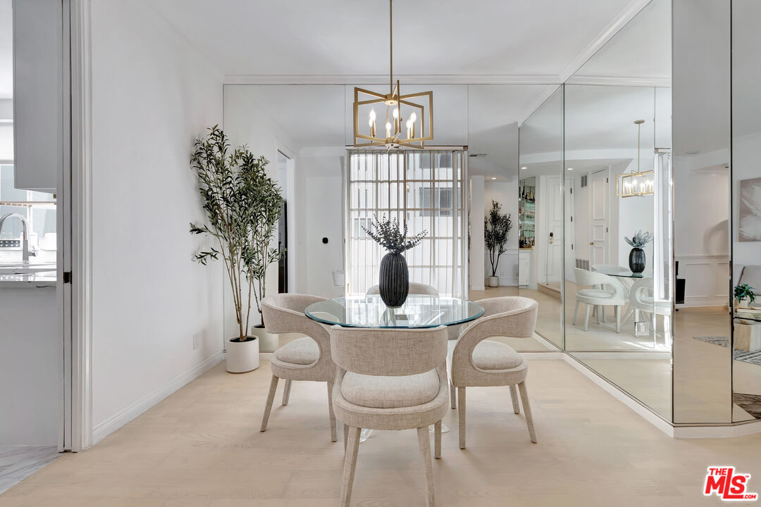 10531 Ashton Avenue, Unit 201 Los Angeles, CA 90024 - Photo 4 of 27 a view of a livingroom with furniture and window