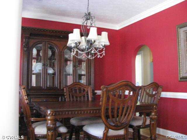 4815 Cottage Road Blackstone, VA 23824 - Photo 2 of 12 Dining Room - formal dining with columns, chair ra