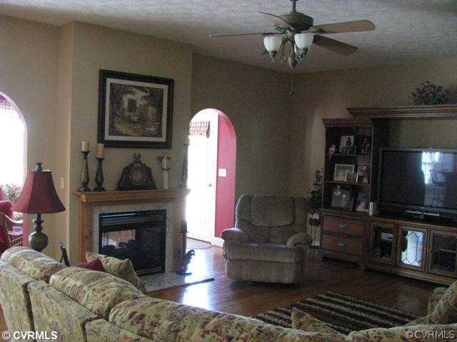 4815 Cottage Road Blackstone, VA 23824 - Photo 12 of 12 Den/Family/Great Room - fireplace, open floor plan