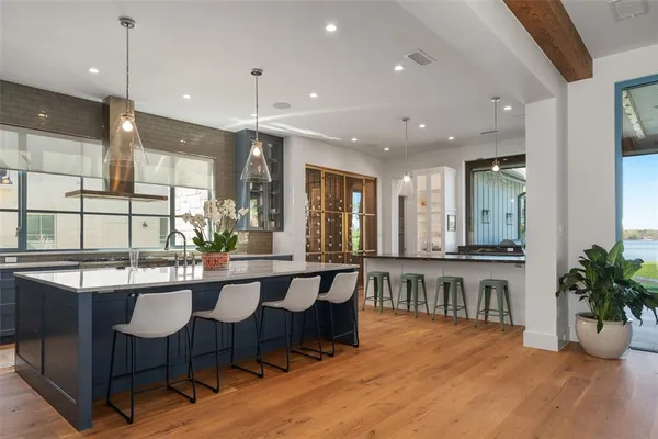 a bathroom with sliding glass door door