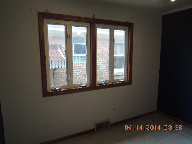 4742 South Kilpatrick Avenue Chicago, IL 60632 - Photo 6 of 21 a view of an empty room with a window