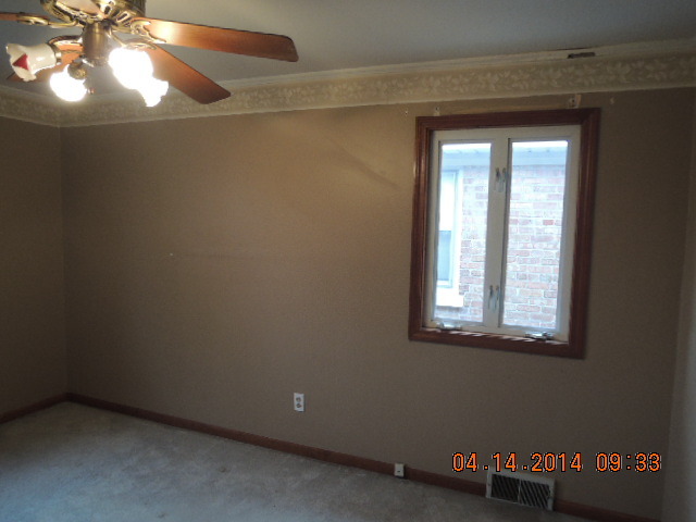 4742 South Kilpatrick Avenue Chicago, IL 60632 - Photo 7 of 21 an empty room with a window