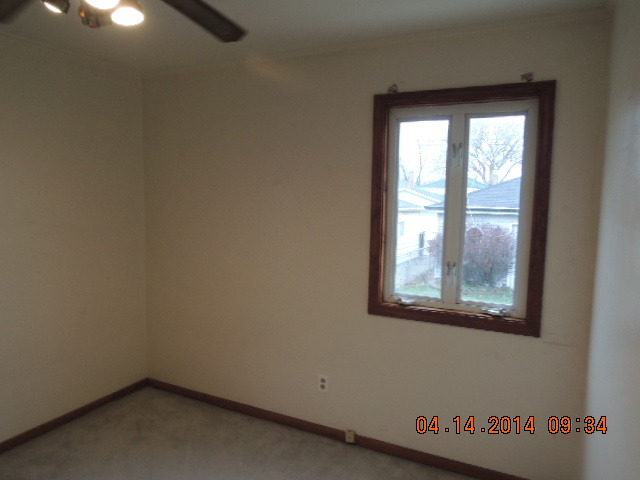 4742 South Kilpatrick Avenue Chicago, IL 60632 - Photo 9 of 21 an empty room with a window